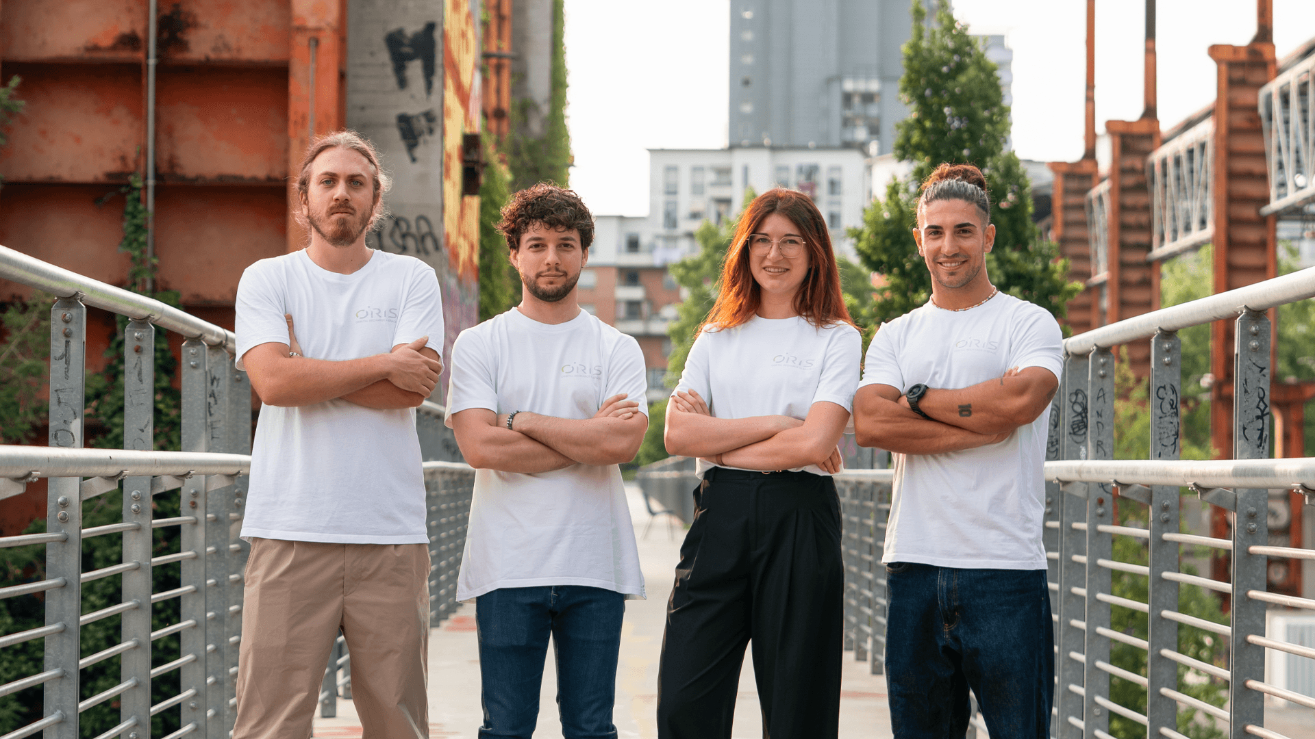 Quattro membri del team ORiS in un ritratto all’aperto